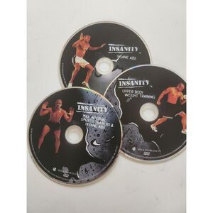 Three workout DVDs from the Insanity 60-day high-intensity fitness B33
